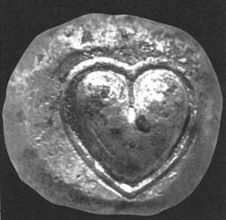 고대 키레네의 은화에 새겨진 실피움 씨앗 모양. 위키미디어 코먼스
