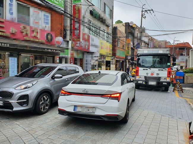 7월28일 부산 수영구 수영팔도시장에 지정된 ‘보행자 우선도로’ 모습. 김영동 기자 <a href="mailto:ydkim@hani.co.kr">ydkim@hani.co.kr</a>