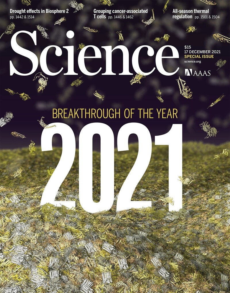 The cover of 'Science' with a picture of a protein folding structure pouring like snow as a background.