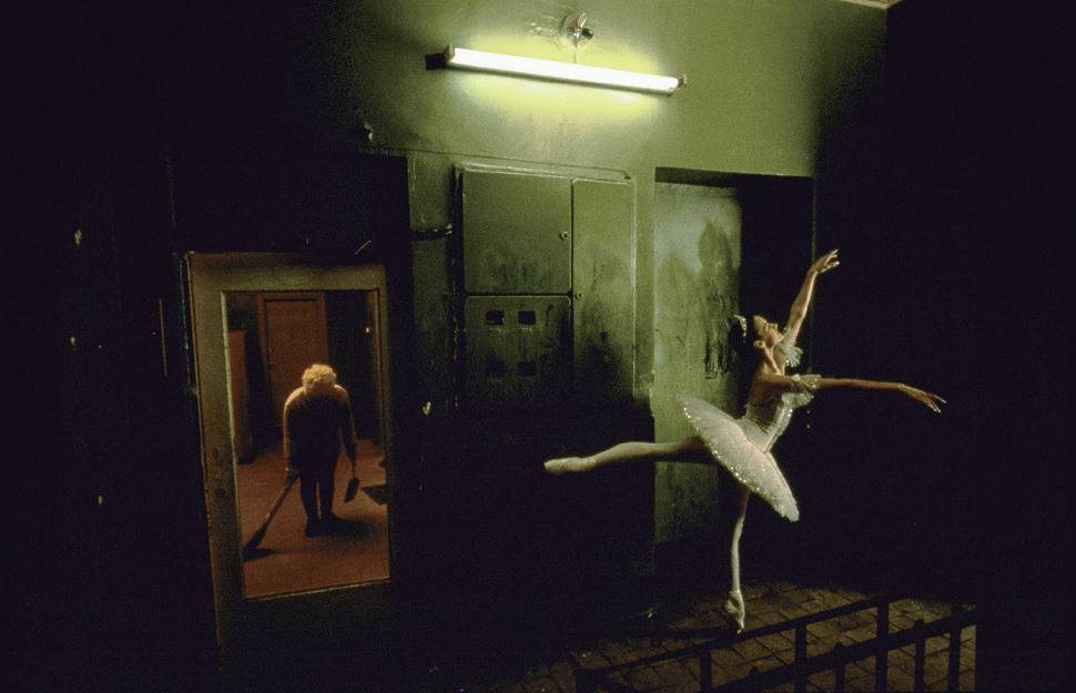 Ballerina Anna Ivanova of Bolshoi Ballet in costume as Aurora fr. Sleeping Beauty in hallway of apt. bldg. on Pokrovsky Boulevard. 1997. Photo by Joe Mcnally ⓒThe LIFE Picture Collection