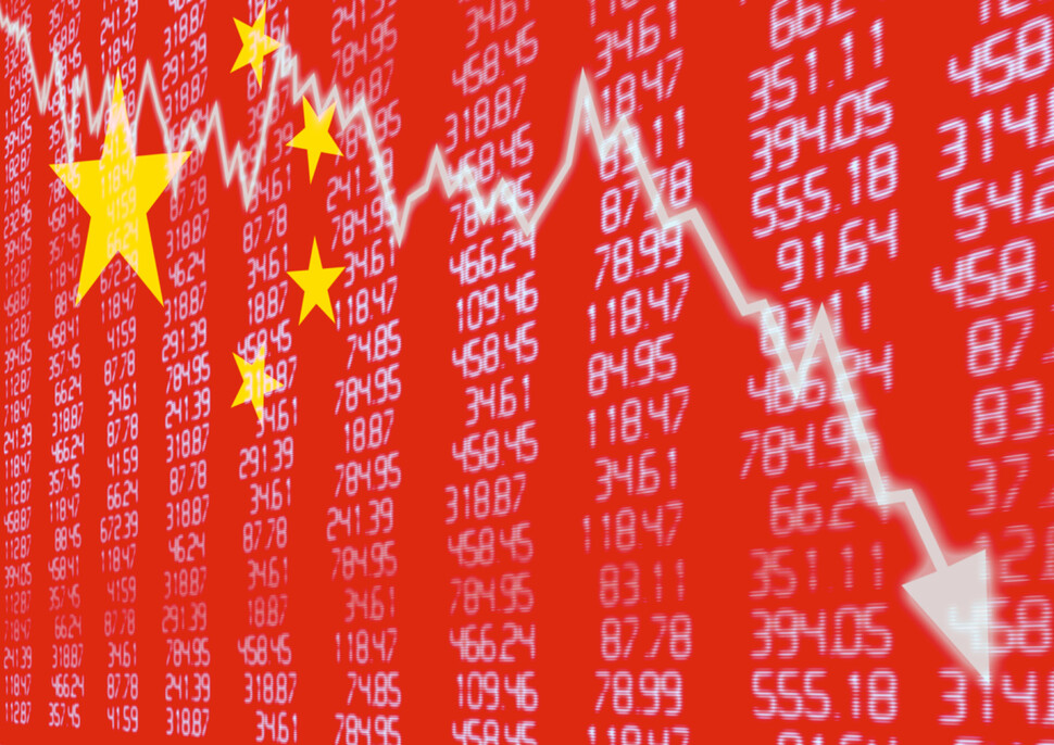 Chinese Stock Market - Arrow Graph Going Down on Red Chinese Flag