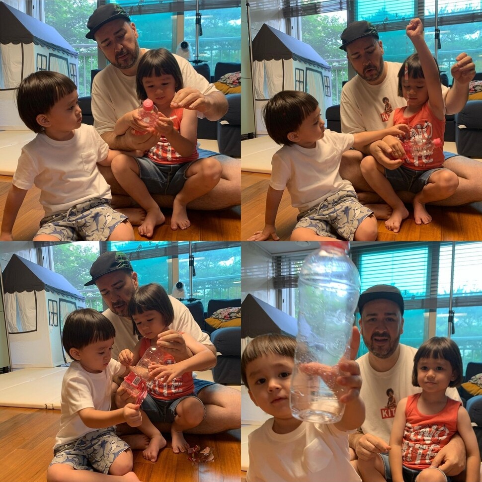 올 7월 인기연예인 샘 해밍턴씨 가두 아이와 함께 투명 페트병에 붙은 라벨을 떼는 모습. &lt;인스타그램&gt; 갈무리