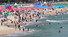 <b>본격적이 휴가철 맞은 해운대</b><br>26일 오후 부산 해운대해수욕장에서 피서객들이 물놀이를 하며 더위를 식히고 있다. 연합뉴스