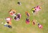 청와대 개방 후 첫 일요일인 15일 오후 청와대를 방문한 시민들이 헬리콥터 착륙장에 깔린 잔디밭에서 휴일을 즐기고 있다. 2022.5.15 연합뉴스