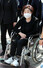 정의당 심상정 의원이 18일 오전 광주 북구 국립 5·18 민주묘지에서 열린 제42주년 5·18민주화운동 기념식에 휠체어를 타고 참석하고 있다.  공동취재사진