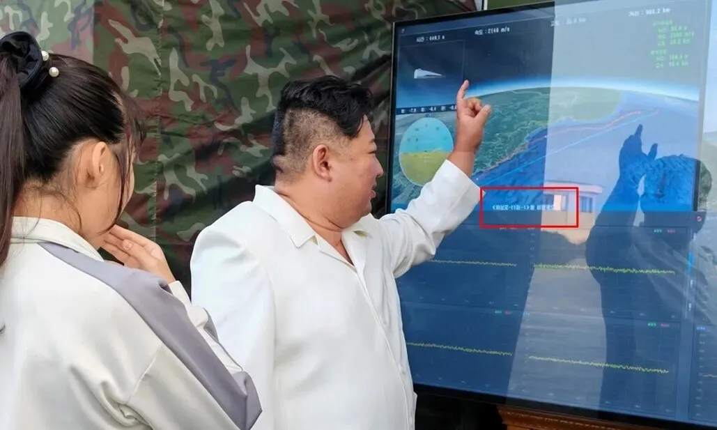 North Korean leader Kim Jong-un was accompanied by his daughter, Ju-ae, when overseeing the test launch of a hypersonic missile at the Missile Administration’s headquarters on Sept. 20, 2026. (KCNA/Yonhap)