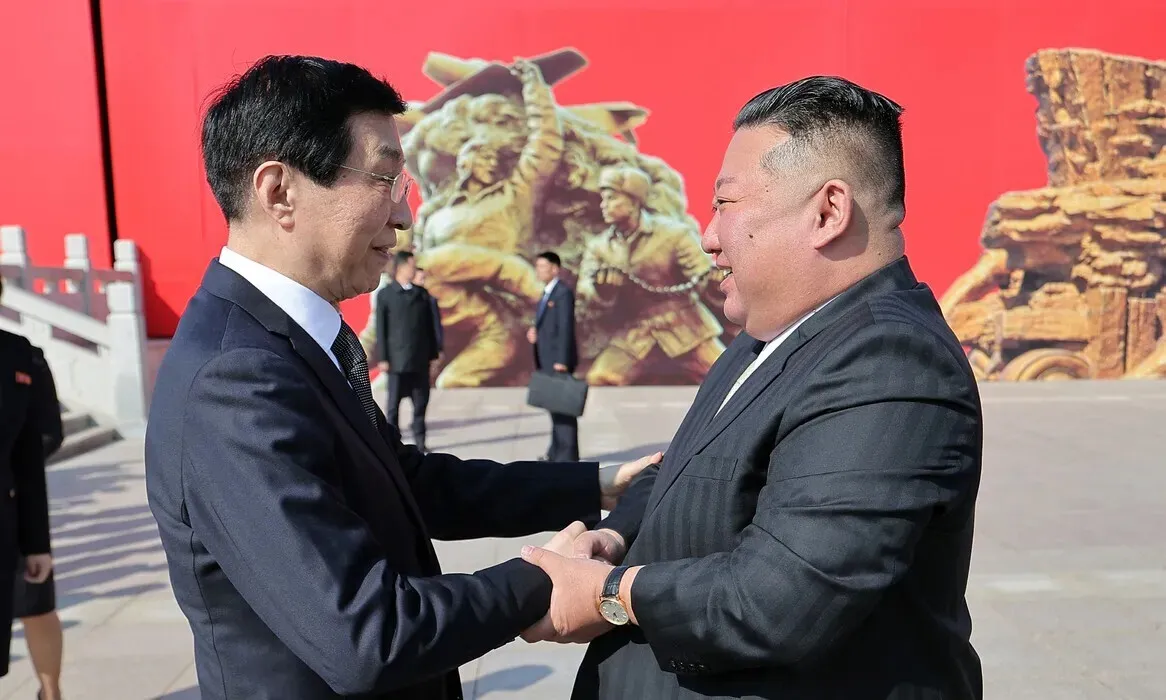 North Korean leader Kim Jong-un (right) shakes hands with Wang Huning, China’s No. 4 official and chairperson of the National Committee of the Chinese People’s Political Consultative Conference, during a visit to Dandong, China, on Oct. 24, 2026. (KCNA/Yonhap)