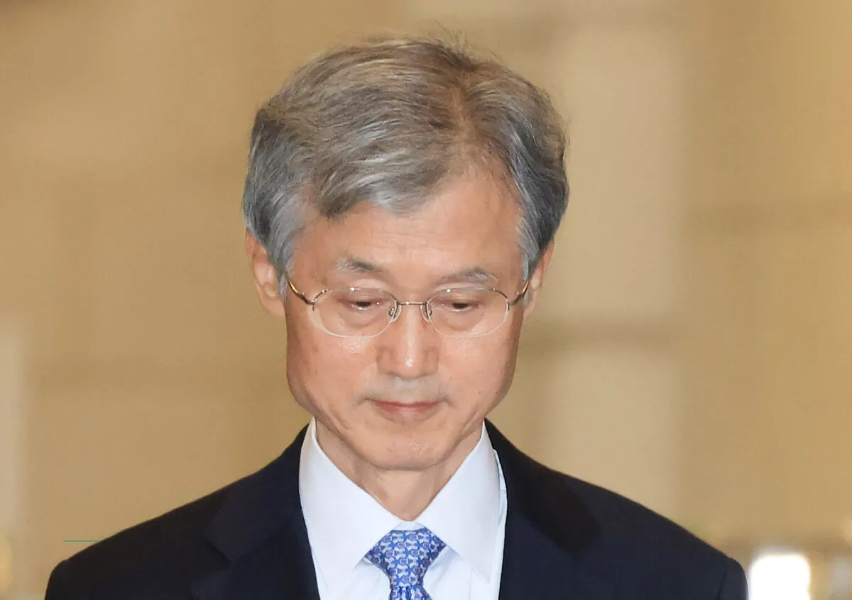 Chief Justice Cho Hee-dae leaving the Supreme Court building in Seocho-gu, Seoul