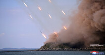 N. Korea fires 130 artillery rounds into buffer zones on either side of peninsula