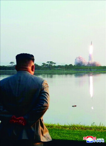 In this photo released by North Korea’s state-run Korean Central News Agency, North Korean leader Kim Jong-un oversees the test launch of short-range missiles from Hodo Peninsula near Wonsan, Kangwon Province, on July 25, 2017. (Yonhap News)