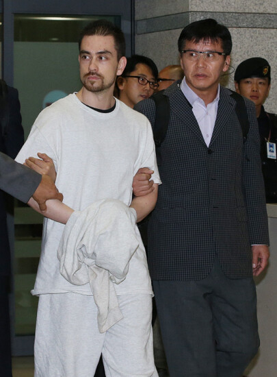 American Arthur Patterson enters South Korea in custody through Incheon International Airport