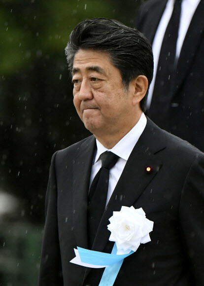 Japanese Prime Minister Shinzo Abe attends a memorial service for the victims of atomic bombing during WWII at Hiroshima Peace Memorial Park on Aug. 6.