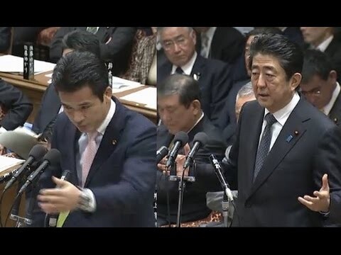 Rep. Rintaro Ogata (left) confronts Prime Minister Shinzo Abe (right) during a Budget Committee meeting in Japan’s House of Representatives