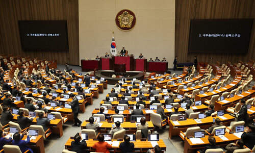 South Korean lawmakers vote to impeach acting president, a first