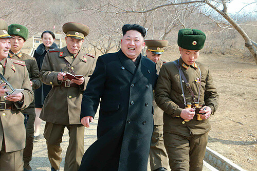  in a photo from the Mar. 12 edition of the Rodong Sinmun newspaper. Kim traveled to the unit just with his sister