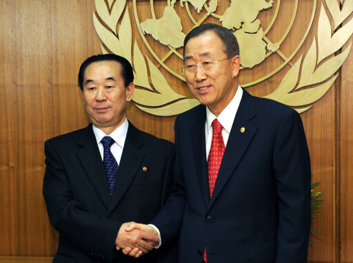  shakes hands with United Nations Secretary General Ban Ki-Moon before their meeting at UN headquarters in New York