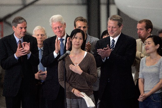  former Vice President Al Gore and former President Bill Clinton after Ling and Lee arrive at Hangar 25 on August 5