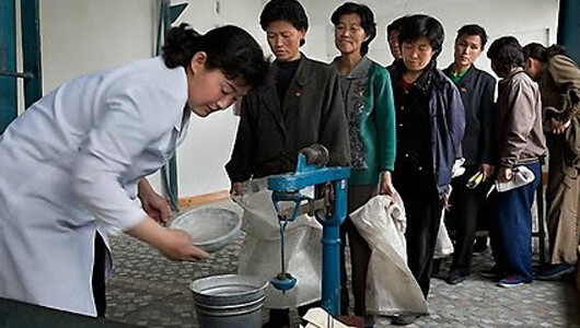 North Korean people receiving food aid