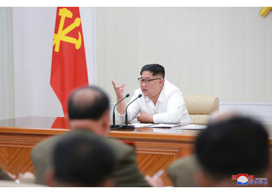 North Korean leader Kim Jong-un discussed and decided upon “organizational measures that will usher in improvements through national defense projects” while presiding over an expanded meeting of the Workers’ Party of Korea (KPA) Central Military Commission (CMC). North Korea’s official newspaper the Rodong Sinmun devoted its entire first page to the meeting as well as nine pages of photographs for its May 18 edition. (KCNA/Yonhap News)