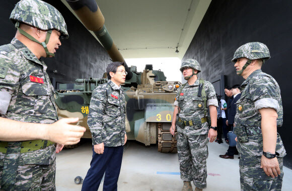 Prime Minister Hwang Kyo-ahn looks around during a visit to a marine unit on Ganghwa Island in Incheon