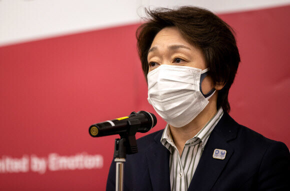 Seiko Hashimoto, the new president of the Tokyo 2020 organizing committee, speaks to reporters in a press conference after attending a meeting of the IOC Executive Board virtually from Tokyo on Feb. 24. (Reuters/Yonhap News)