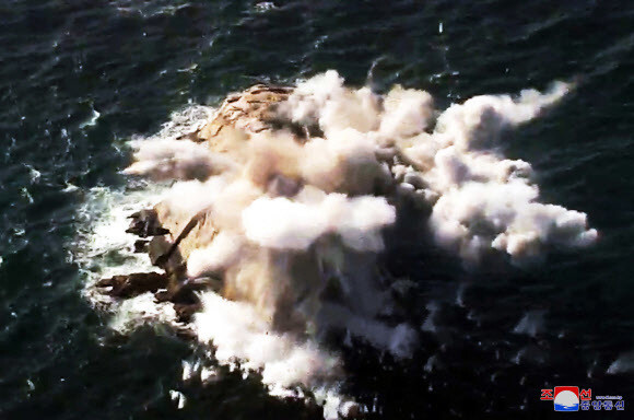 An image of North Korea’s multiple-rocket launchers’ island target being “destroyed.”