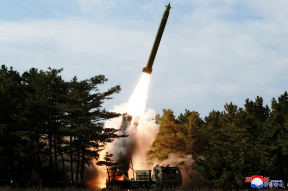 North Korea fires multiple-rocket launchers from the Wonsan area on Mar. 2. (KCNA/Yonhap News)