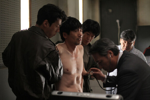  showing democracy activist Kim Geun-tae having (played by actor Park Won-sang