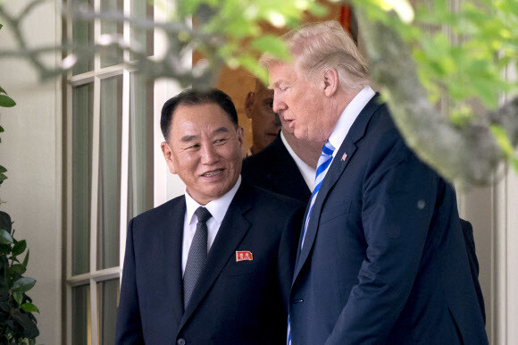 US President Donald Trump talks with Kim Yong-chol