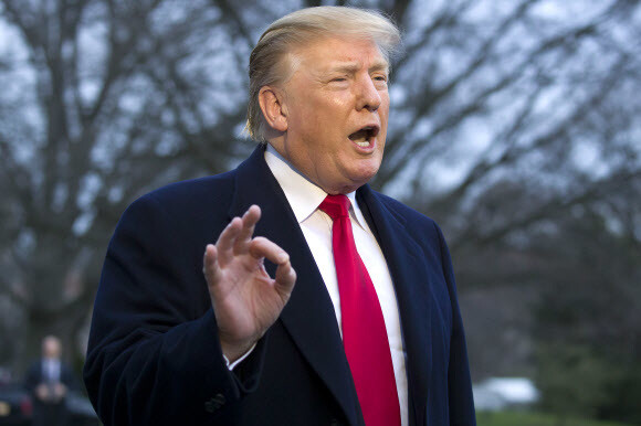 US President Donald Trump says the Mueller reports show no evidence of collusion with Russia on the White House South Lawn on Mar. 24. (AP)