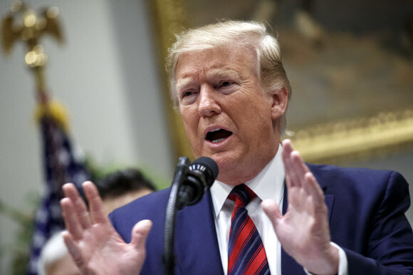 US President Donald Trump talks to reporters at the White House on May 9. (EPA/Yonhap News)