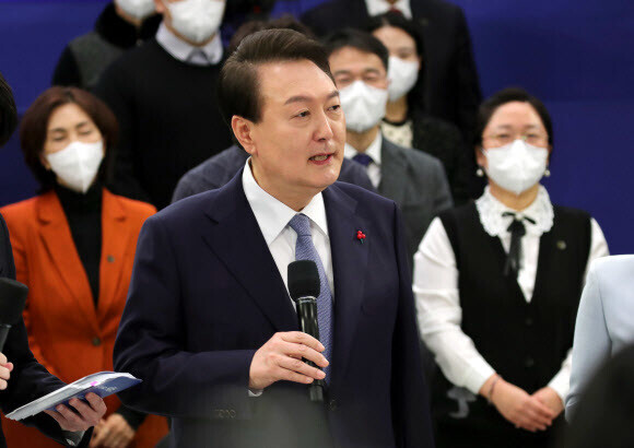 President Yoon Suk-yeol speaks at a review of national tasks held at the Blue House guesthouse on Dec. 15. (Yonhap)