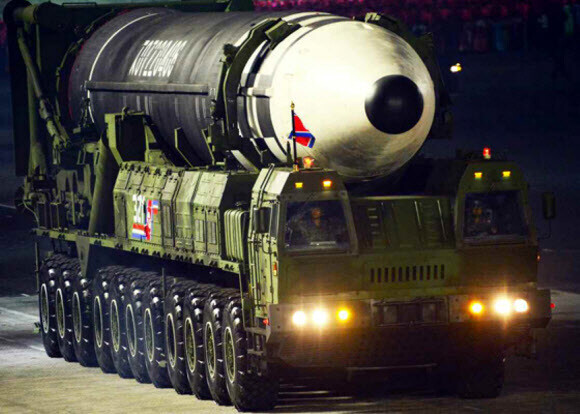 North Korea unveils a new ICBM during a military parade for celebrating the 75th anniversary of the Workers’ Party of Korea in Pyongyang on Oct. 10. (Yonhap News)