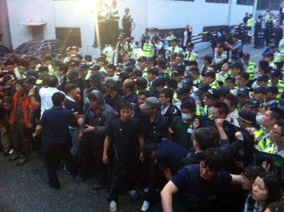 A clash between labor unionists and police outside the Gangnam branch of Seoul Medical Center
