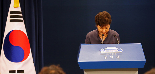 President Park Geun-hye bows after making a public apology for the Choi Sun-sil scandal