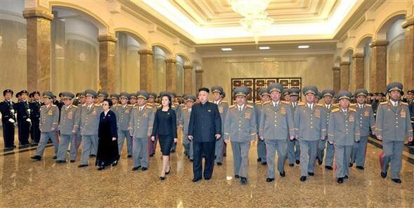  lead a group of North Korea’s military leadership on Feb. 16 in Pyongyang going to pay tribute to Kim Il-sung and Kim Jong-il on what would have been former leader Kim Jong-il’s 71st birthday. (KCNA)

