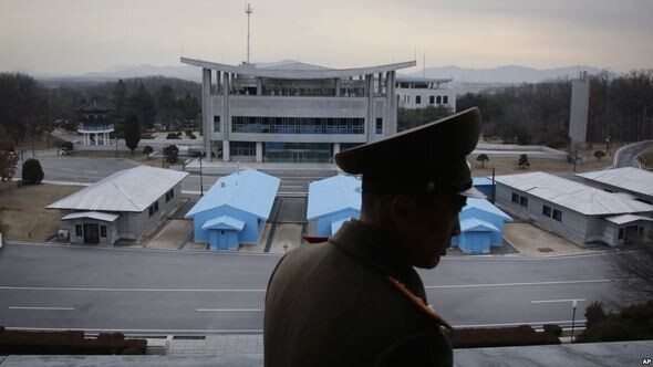 The view looking south from the North Korean side of the Panmunjeom Joint Security Area. Directly in front are the meeting rooms for the Neutral Nations Supervisory Board and the Military Armistice Commission. The Freedom House building figures prominently in the center of the photo