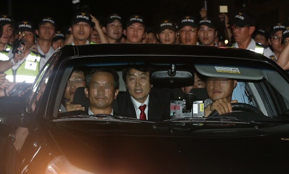  Sep. 4. He was held overnight at a police station in Suwon. (National Assembly photo pool)