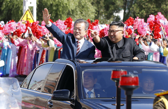 South Korean President Moon Jae-in and North Korean leader Kim Jong-un on a convoy parade through the streets of Pyongyang after the inter-Korean summit’s welcome ceremony on Sept. 18.


