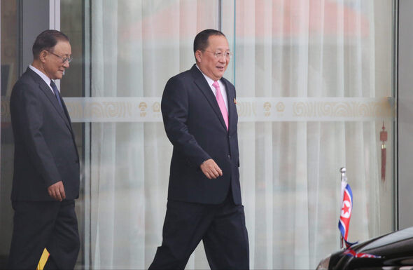 North Korean Foreign Minister Ri Yong-ho walks to his car upon arriving at the Beijing Capital Airport after being welcomed by North Korean Ambassador to China Ji Jae-ryong on Sept. 26. (Yonhap News)
