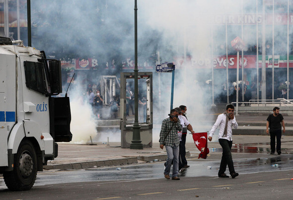 Taksim Square in Istanbul is shrouded in tear gas fired by police on June 11.
