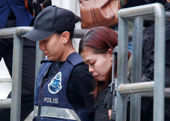 Indonesian national Siti Aisya leaves court in Malaysia on Mar. 1 after being indicted on murder charges in the killing of Kim Jong-nam. (AP/Yonhap News)