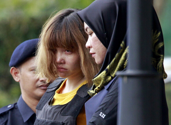 Vietnamese national Doan Thi Huong leaves court in Malaysia on Mar. 1 after being indicted on murder charges in the killing of Kim Jong-nam. (AP/Yonhap News)