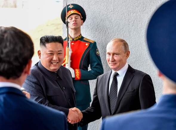 North Korean leader Kim Jong-un shakes hand with Russian President Vladimir Putin ahead of their summit in Vladivostok on Apr. 25. (AFP/Yonhap News)