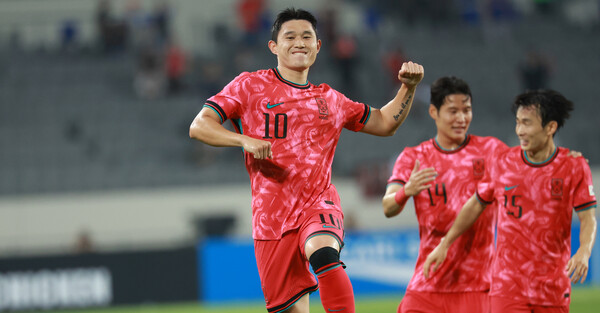 Lee Dong-kyung is pleased with the first goal in the 2025 East Asian Football Federation (EAFF) E-1 Championship in Yongin Mirstadium, Gyeonggi-do. Yonhap News