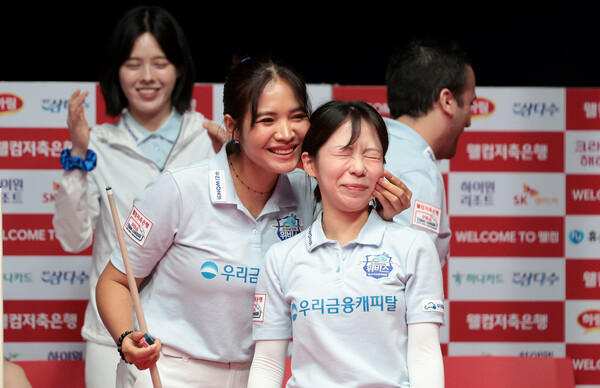 Woori Financial Capital's Throng Piaby and Kim Min -young. PBA provided