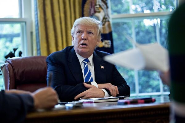 US President Donald Trump conducts an interview with Bloomberg at the White House in Washington DC