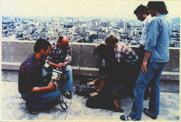 Courtright (second right) with journalist Jürgen Hinzpeter (far left) on the roof of Chonnam National University Hospital during the events of the Gwangju Democratization Movement of May 18, 1980. (provided by the May 18 Memorial Foundation)