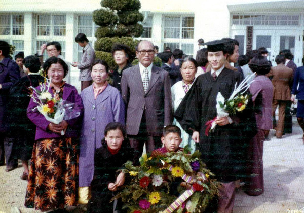 Yoon (far right) and his during his graduation ceremony at Chonnam National University in February 1978. (provided by Yoon’s family)