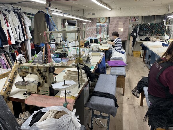 A sewing company in Seoul’s Yongsan District makes clothing for the Dongdaemun clothing market on June 1.